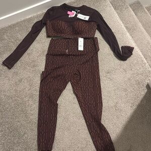 Ivy park monogram crop top and tights. Both sized XL. New with tags.